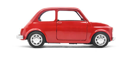 red retro car toy model isolated on white background